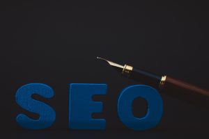 SEO letters with pen on top